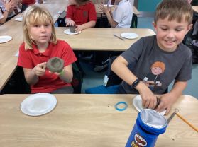 Making Neolithic style clay pots in P5 Room 8