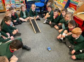 Fair Test : Investigation into how far a toy car travels when the height of the ramp or the surface is changed